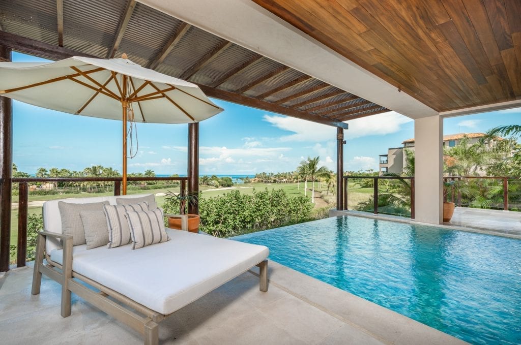 Condo Ocaso Lindo E101 shaded daybed beside the pool — Punta Mita Nayarit, Mexico