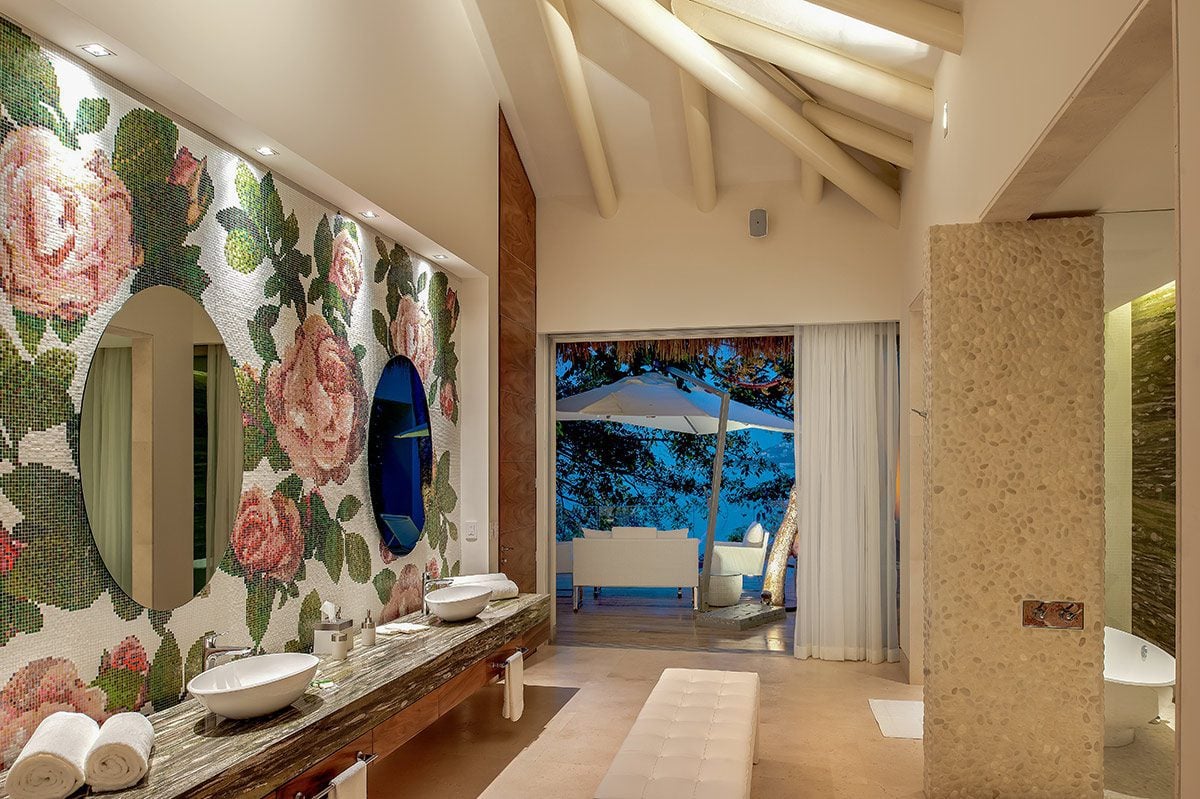 Casa Papelillos el Paredon floral bathroom wall and vanity opening to the bay — Puerto Vallarta, Mexico