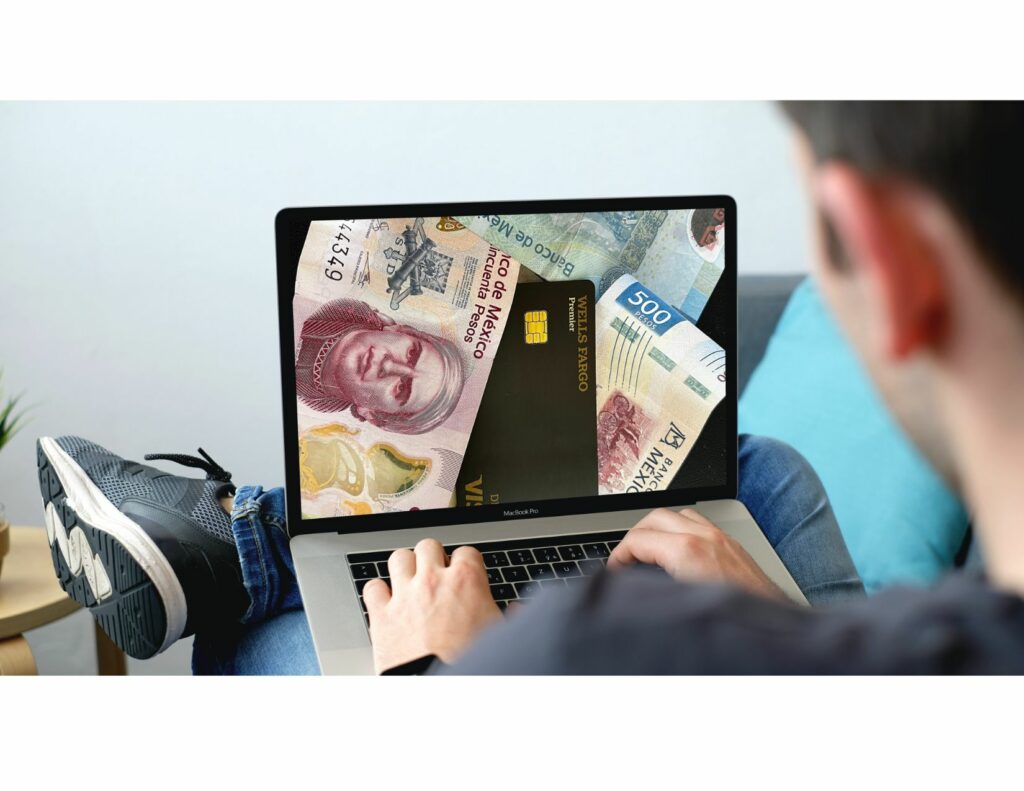 A traveler surfing the internet on his laptop, researching information about Mexican pesos, ATMs, and other financial options in Mexico.