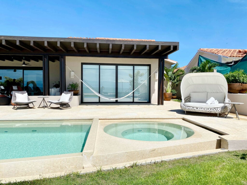 Casa del Muelle pool and round tiled basin with hammock and shaded daybed — Punta Mita Nayarit, Mexico
