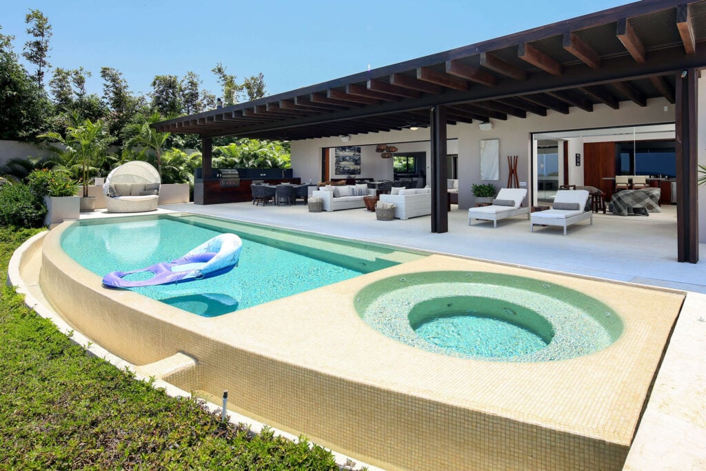 Villa Rincon del Mar swimming pool and round pool section seen from the lawn — Punta Mita Nayarit, Mexico
