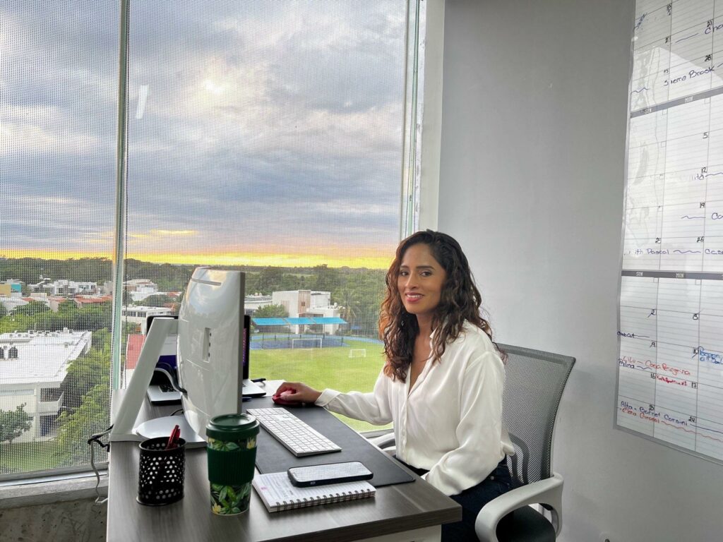 A dedicated villa specialist working at the Villa Experience headquarters, expertly coordinating luxurious vacation stays for clients.