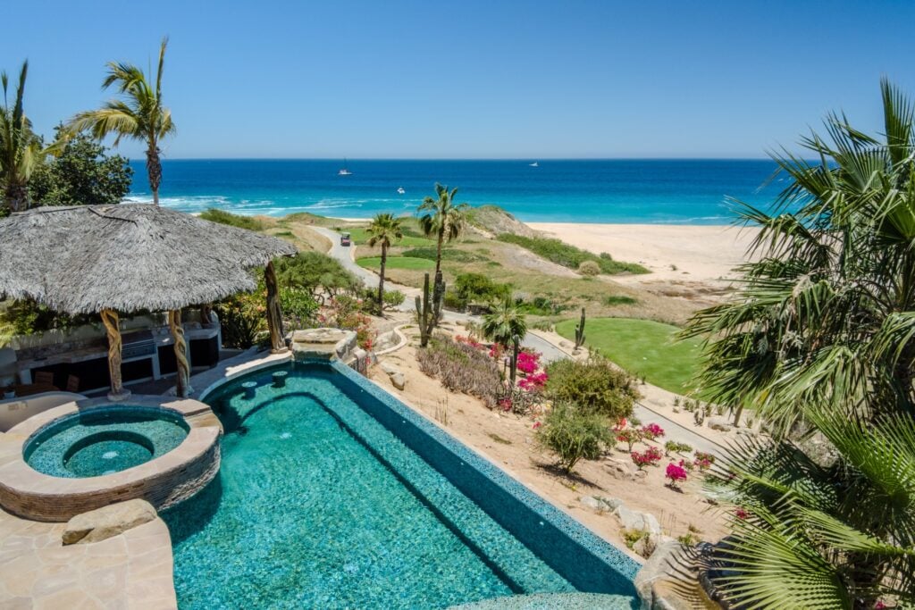 Villa Buenavista #8 at Cabo del Sol elevated view of pool, spa and palapa above the beach — Los Cabos, Mexico