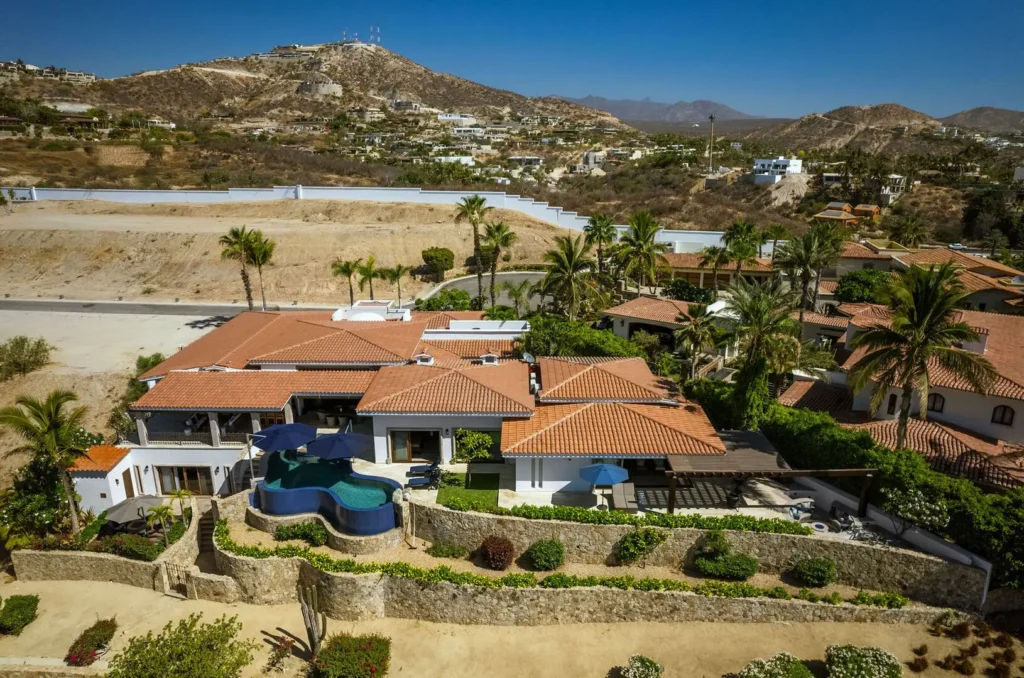 Villa Esperanza aerial view of the villa, pool and dry hills — Los Cabos, Mexico