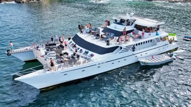 Luxury yacht anchored in Banderas Bay during a Yelapa waterfall tour in Puerto Vallarta