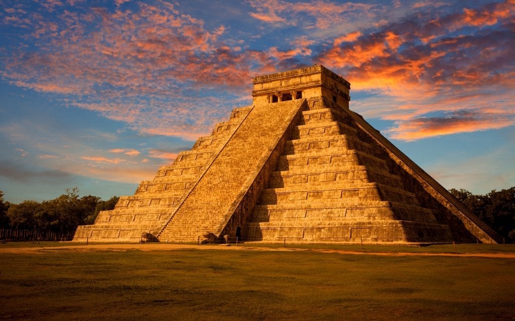 Kukulkan pyramid at sunset Chichen Itza Mexico