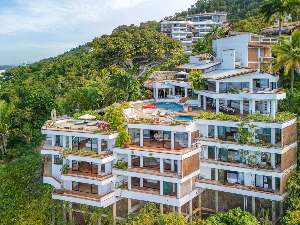 Hacienda Las Flores planted balconies stepping down the jungle hillside — Puerto Vallarta, Mexico