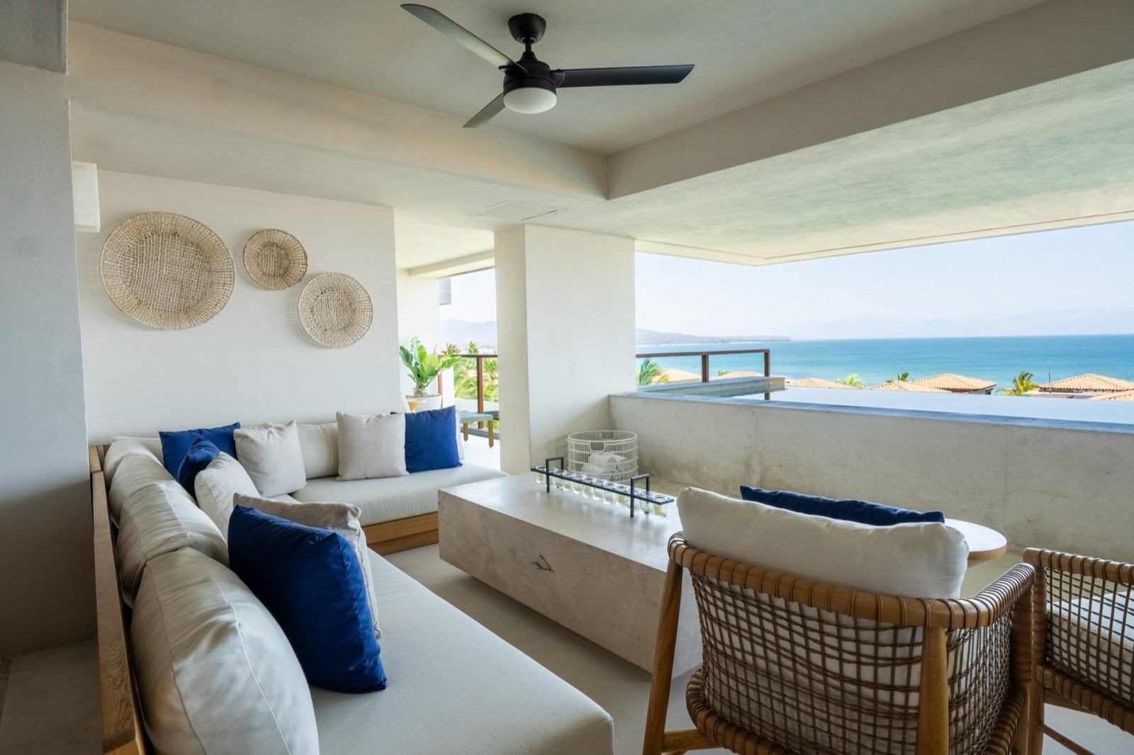 Condo El Encanto 1021 covered terrace seating around a long table overlooking the ocean — Punta Mita Nayarit, Mexico
