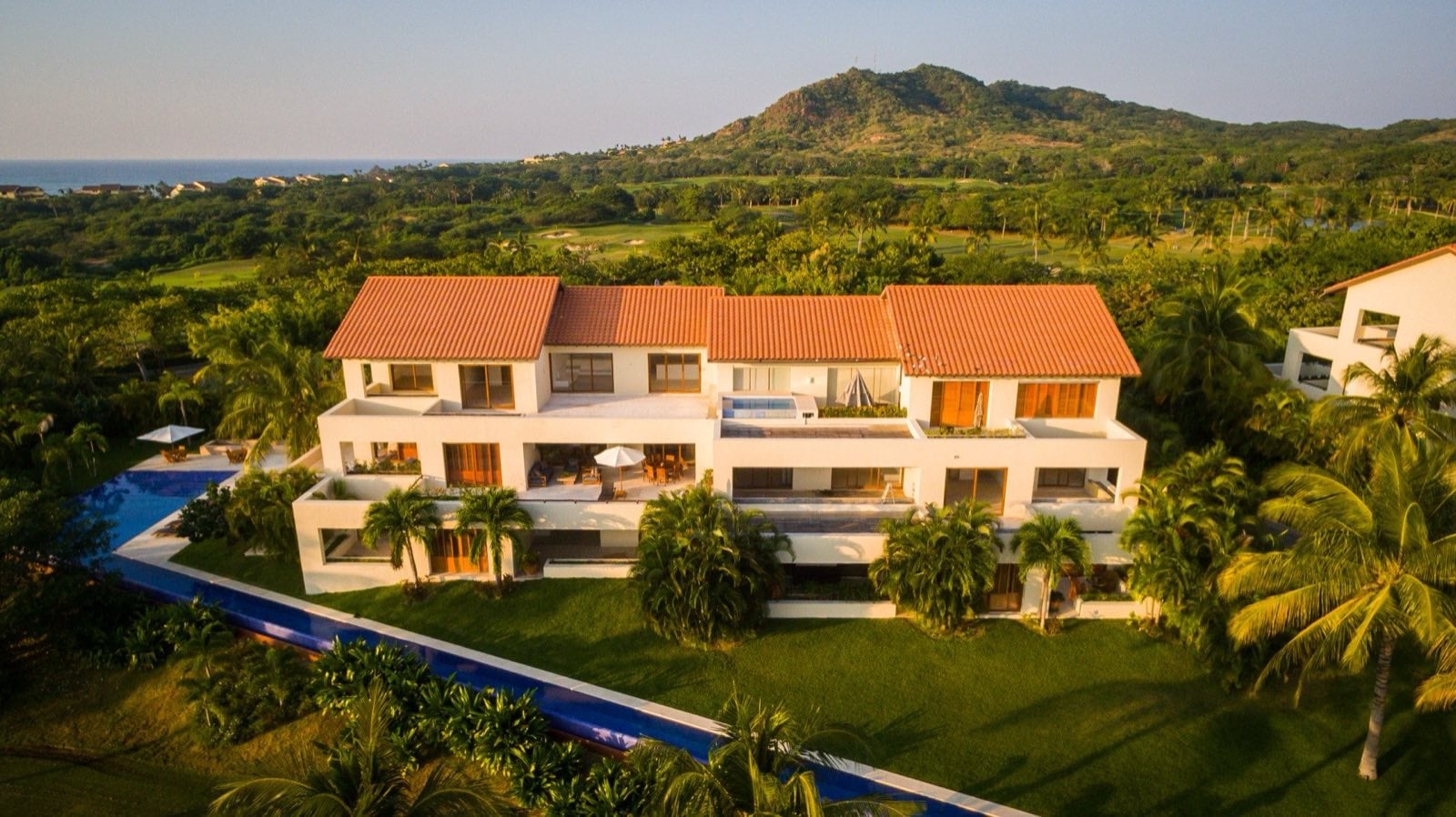 Condo Terazzas P23 aerial view of the residence with hillside and ocean beyond — Punta Mita Nayarit, Mexico