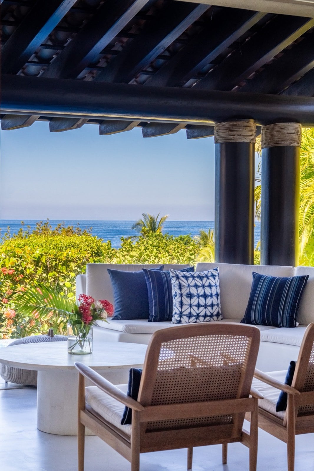 Four Seasons Villa 2037 covered terrace with sofas, chairs and a sea view — Punta Mita Nayarit, Mexico