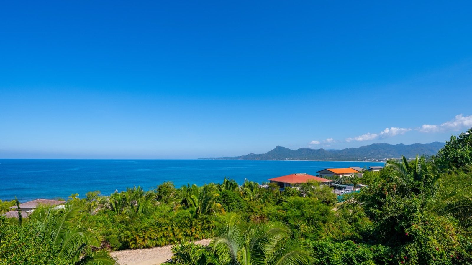 Villa La Vista elevated view over treetops to the beach and ocean — Punta Mita Nayarit, Mexico