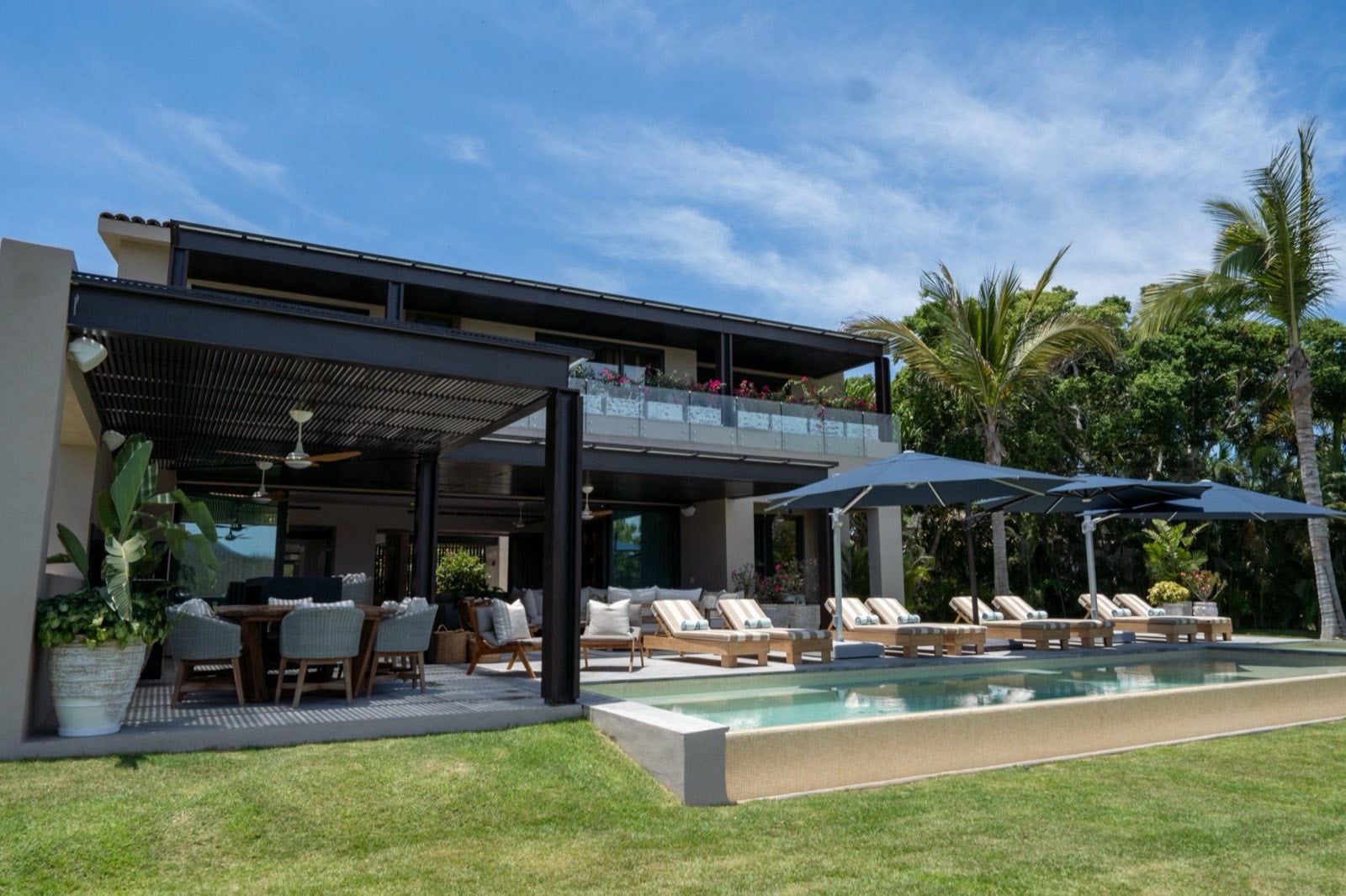 Villa Porta Fortuna 6 rear exterior with a pool, loungers, and covered terraces — Punta Mita Nayarit, Mexico