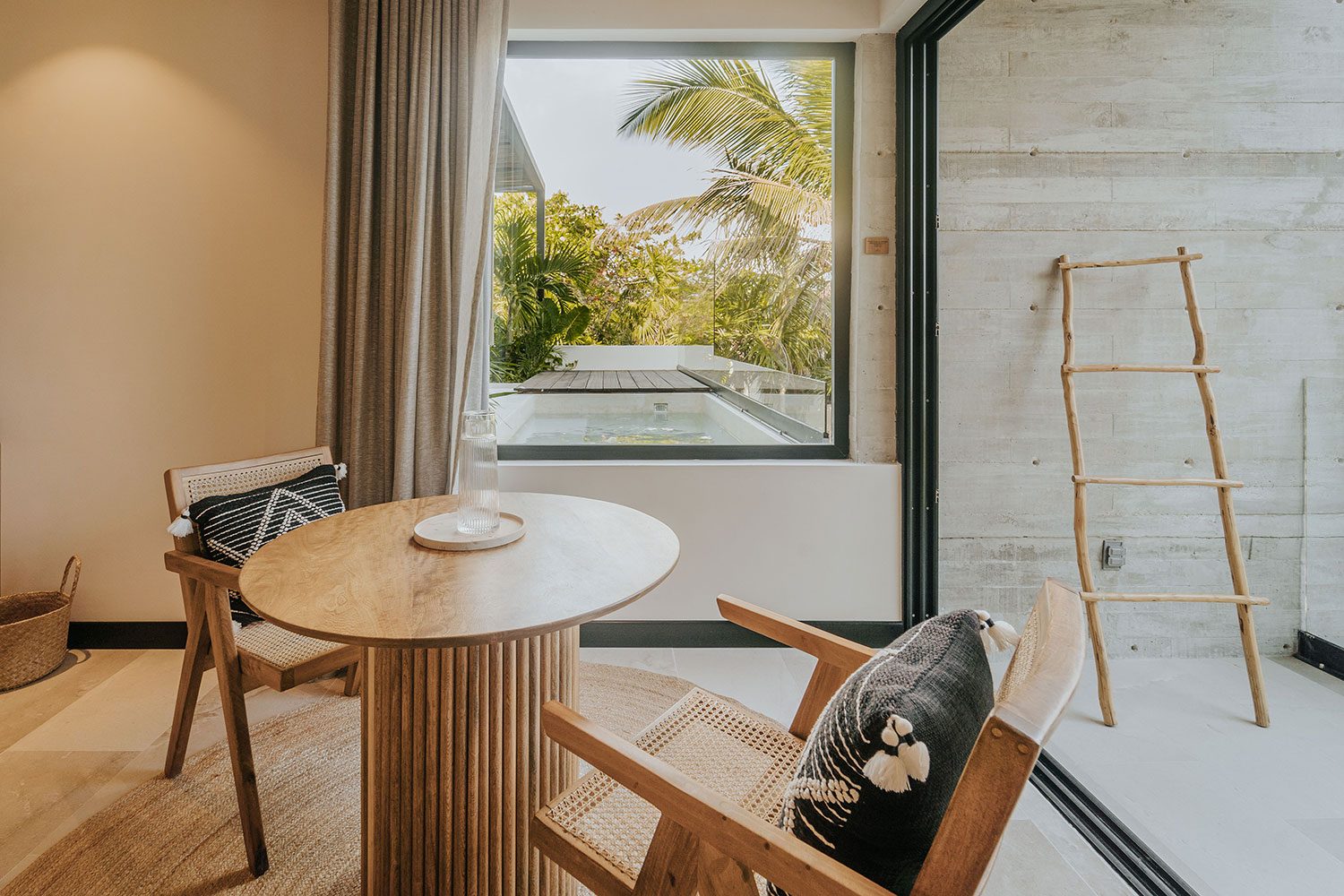 Azumaya Beach House wooden dining nook with plunge pool and palm views — Soliman Bay Tulum