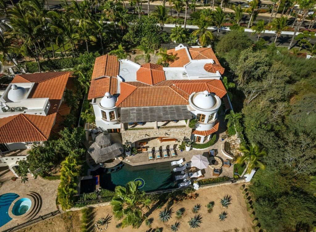 Casa Primera overhead aerial view of the red roofs, pool and gardens — Los Cabos, Mexico