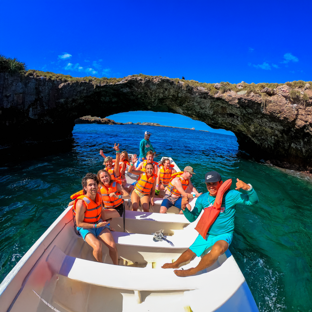 Marietas Islands boat tour approaching Hidden Beach from Punta Mita