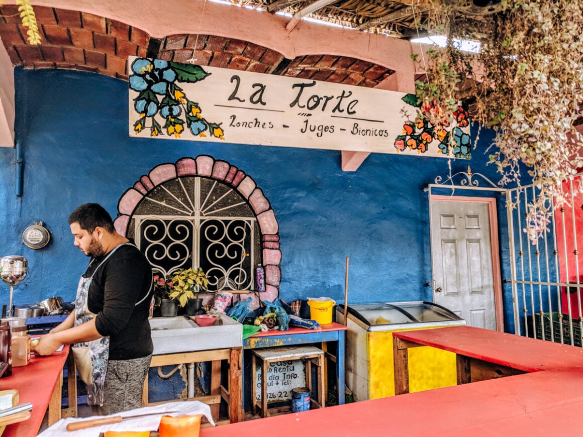 Colorful streets, artisan shops, and food stalls in Sayulita, a 20-minute day trip from Punta Mita