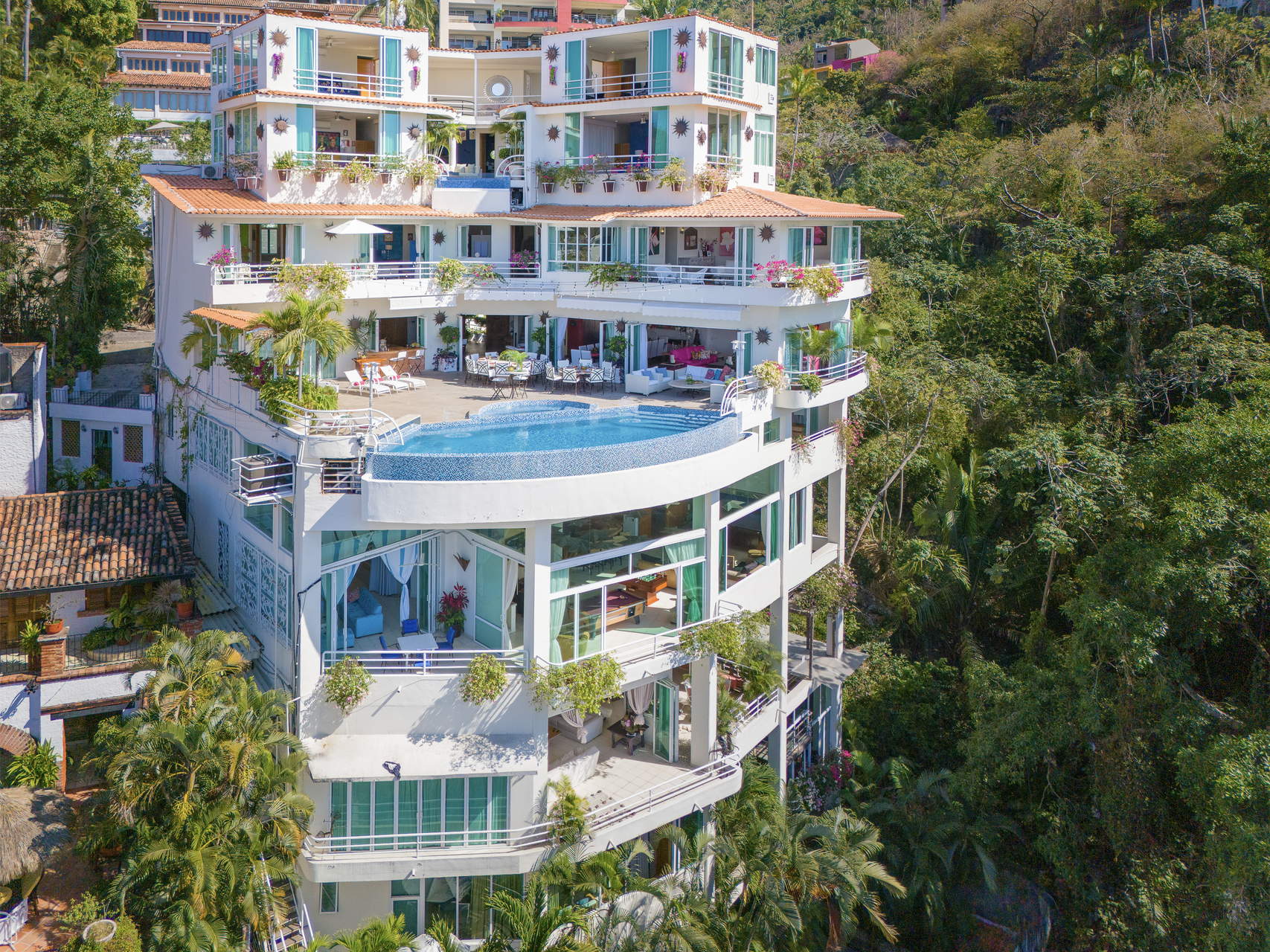 Villa Yvonneka elevated view of curved terraces amid jungle — Puerto Vallarta, Mexico